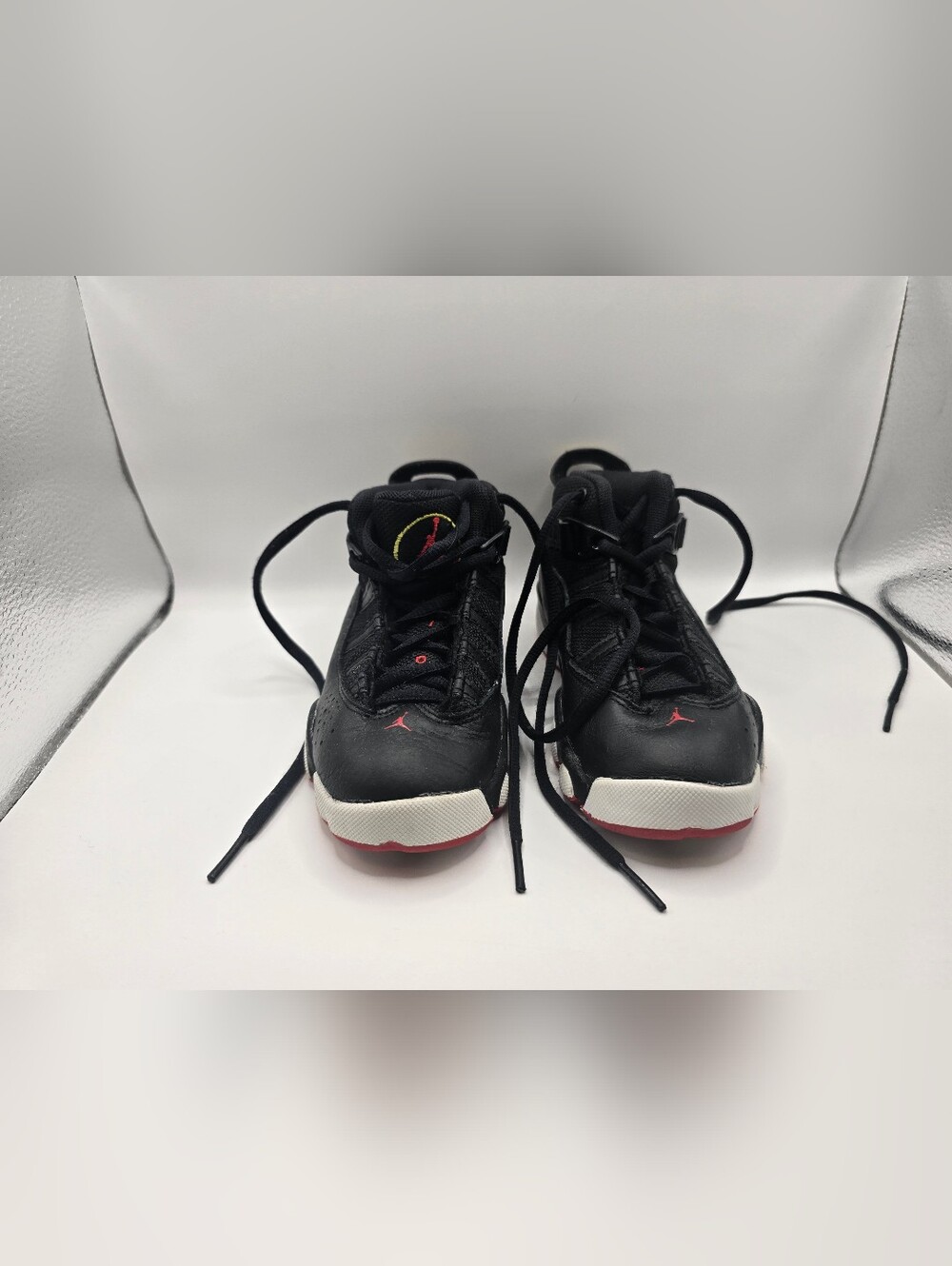 Jordan Kids Black Sneakers with Red and White Accents